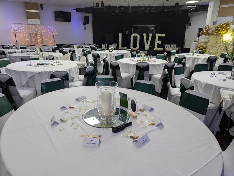 Illuminated LOVE letters at an elegant wedding